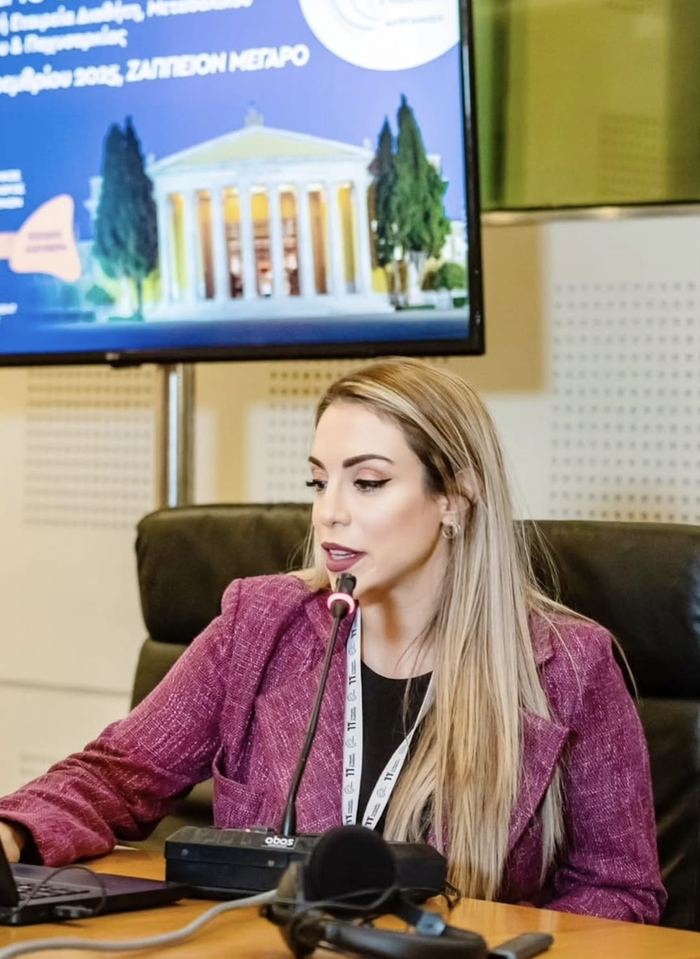 Anna Cortesi speaking at a professional conference